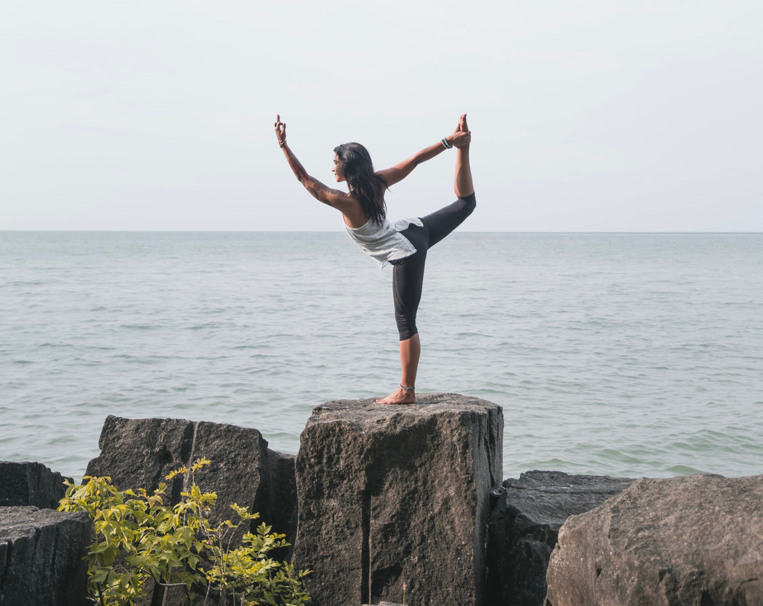 Women doing yoga outside 